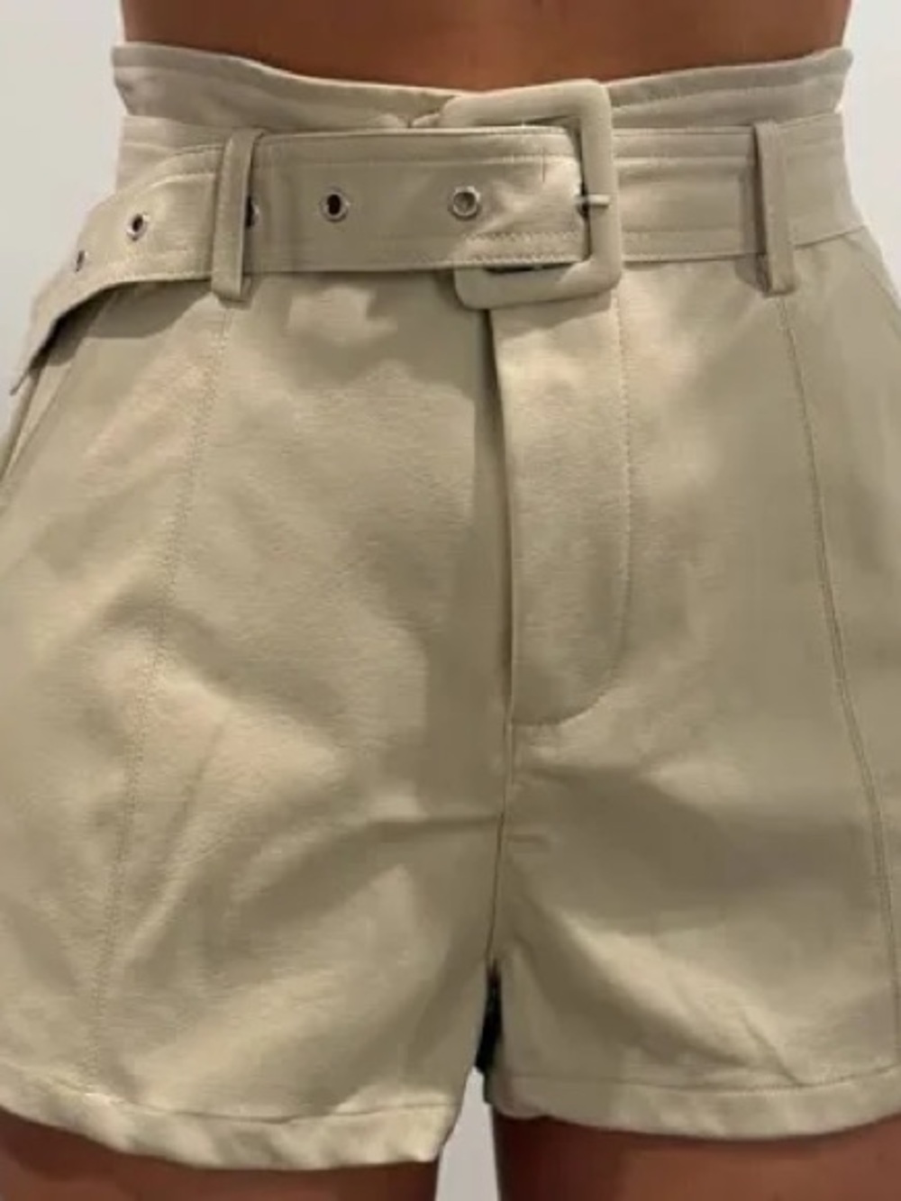 Altar'd State High-Waist Belted Shorts in Light Tan faux leather